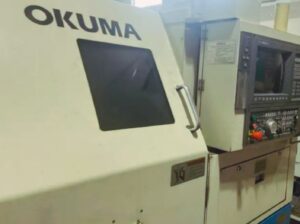 CNC लेथ मशीन OKUMA LR 15 – ड्रिवन टूल्स के साथ