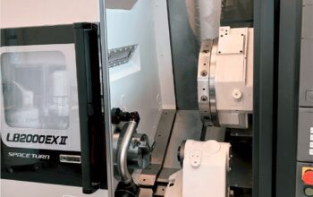 बिक्री हेतु: 3‑अक्ष CNC लेथ Okuma SpaceTurn LB‑2000EXII – सटीकता और प्रदर्शन
